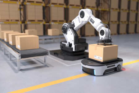 The Robot arm picks up the box to Autonomous Robot transportation in warehouses, Warehouse automation concept