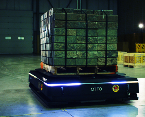 OTTO 1500 Autonomous Mobile Robot (AMR) moving pallets in a warehouse. An example of manufacturing automations, warehouse automation, eCommerce automation, and autonomous material handling.