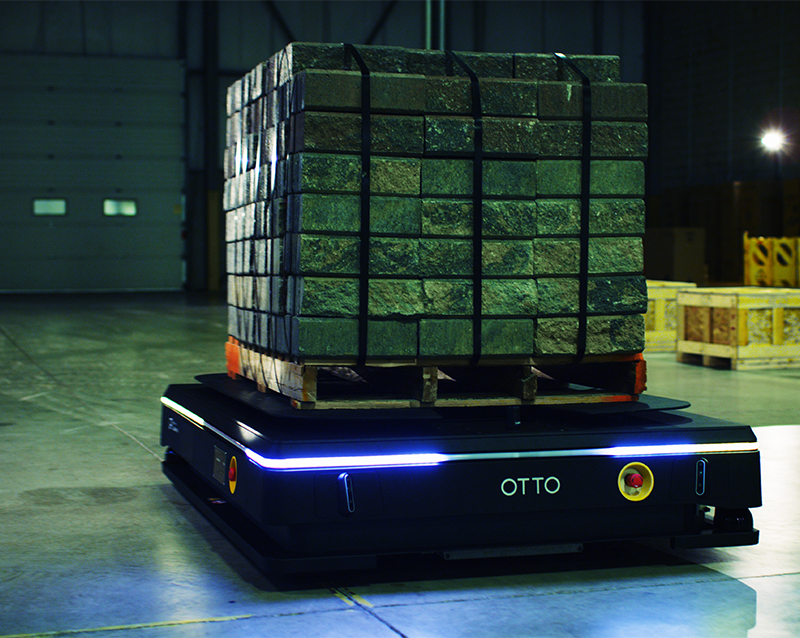 OTTO 1500 Autonomous Mobile Robot (AMR) moving pallets in a warehouse. An example of manufacturing automations, warehouse automation, eCommerce automation, and autonomous material handling.