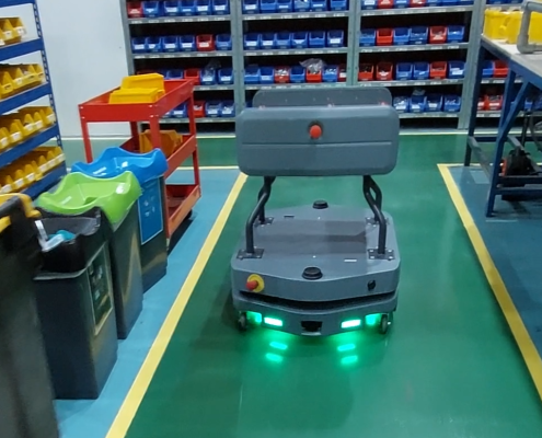 Guidance Automation autonomous vehicle transporting materials through a manufacturing facility
